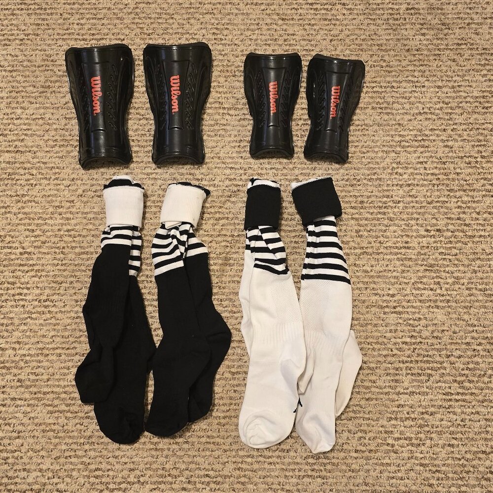Wilson shin guards- pee wee/youth. Mitre Soccer Socks- Jr (3-6) and Mini (12-2)